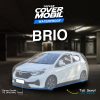 Cover mobil transparan premium merek Topcar melindungi mobil di dalam garasi